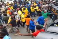 Mahasiswa menggelar aksi unjuk rasa menolak Proyek Investasi dan keberadaann militer di Tanah Papua