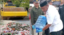 Wakil Bupati Teluk Bintuni, turut memusnahkan Miras Ilegal Sitaan Polres Teluk Bintuni